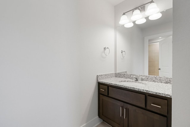 265 Tierra Trl, Dripping Springs, TX 78620 - bathroom featuring vanity and baseboards