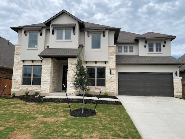 221 Camille St, Leander, TX 78641 - view of front of house with stucco siding, stone siding, and roof with shingles