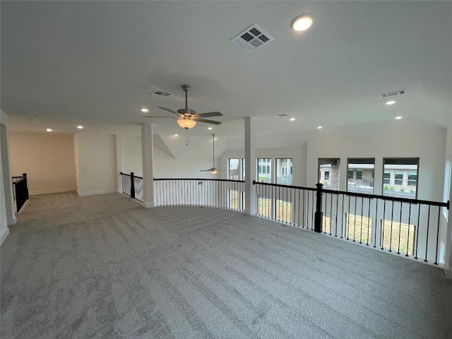 221 Camille St, Leander, TX 78641 - spare room with ceiling fan, plenty of natural light, recessed lighting, light colored carpet, and vaulted ceiling