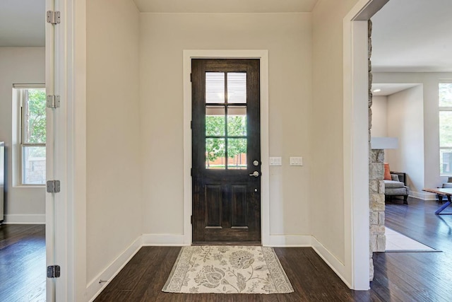 3105 Mccurdy St, Austin, TX 78723 - foyer entrance with healthy amount of natural light and dark wood-type flooring