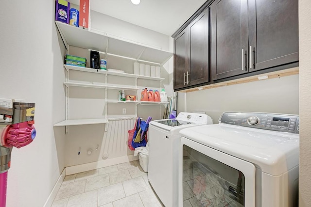 3105 Mccurdy St, Austin, TX 78723 - laundry area with washing machine and clothes dryer and cabinet space