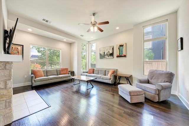 3105 Mccurdy St, Austin, TX 78723 - living room featuring dark wood-type flooring, a ceiling fan, and recessed lighting