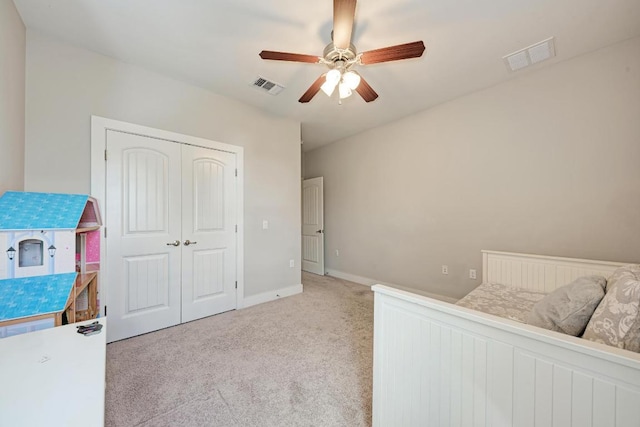 3105 Mccurdy St, Austin, TX 78723 - carpeted bedroom with a closet and a ceiling fan