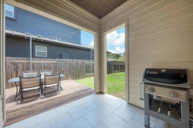 3105 Mccurdy St, Austin, TX 78723 - fenced backyard featuring a grill, outdoor dining area, a deck, and a patio area