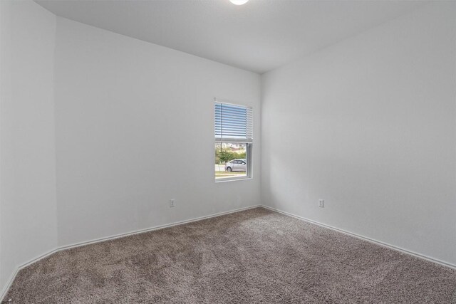 929 Wildrye Ct, Leander, TX 78641 - carpeted empty room featuring baseboards