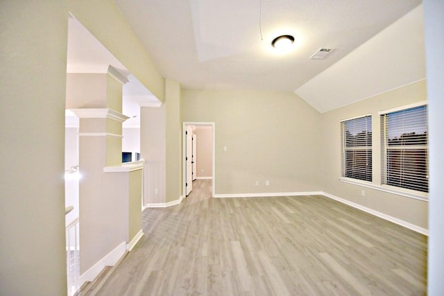 1933 Chasewood Dr, Austin, TX 78727 - unfurnished room with light wood-style flooring and vaulted ceiling