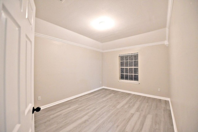 1933 Chasewood Dr, Austin, TX 78727 - unfurnished room featuring wood finished floors and a textured ceiling
