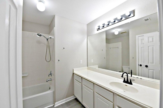 1933 Chasewood Dr, Austin, TX 78727 - bathroom featuring vanity and bathtub / shower combination
