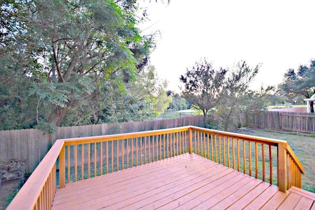 1933 Chasewood Dr, Austin, TX 78727 - wooden terrace featuring a fenced backyard