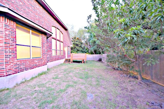 1933 Chasewood Dr, Austin, TX 78727 - fenced backyard featuring a wooden deck