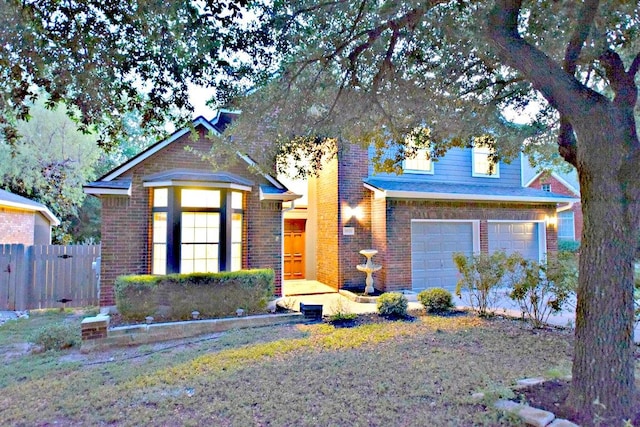 1933 Chasewood Dr, Austin, TX 78727 - view of front of property with brick siding and an attached garage