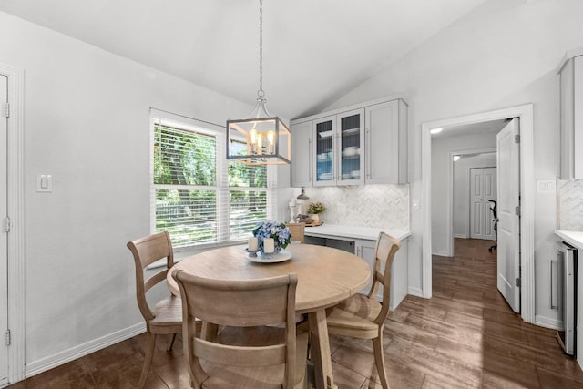 507 S Lake Creek Dr, Round Rock, TX 78681 - dining room featuring vaulted ceiling, a chandelier, beverage cooler, and wood finished floors