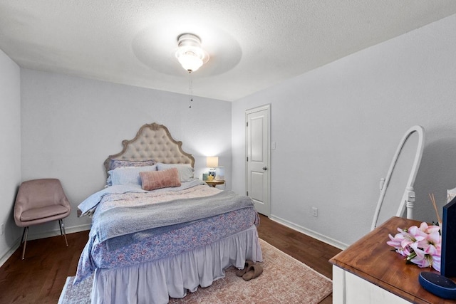 507 S Lake Creek Dr, Round Rock, TX 78681 - bedroom featuring wood finished floors and baseboards