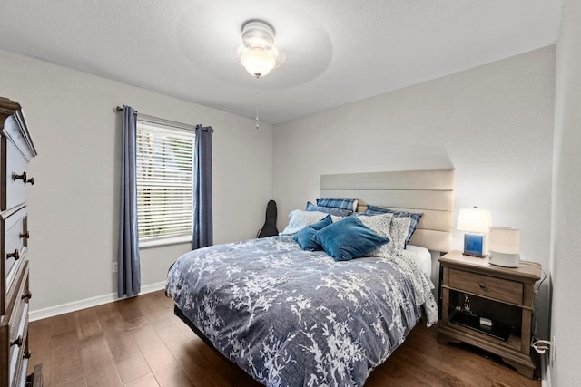 507 S Lake Creek Dr, Round Rock, TX 78681 - bedroom featuring wood finished floors and baseboards