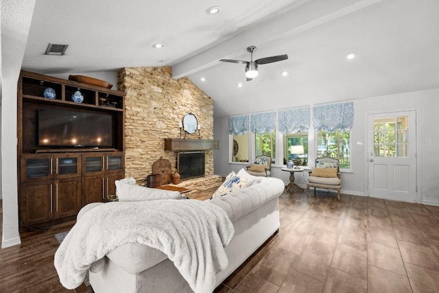 507 S Lake Creek Dr, Round Rock, TX 78681 - living area with a stone fireplace, ceiling fan, and wood finished floors