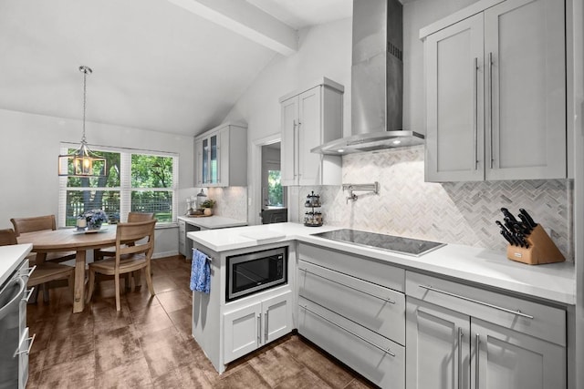 507 S Lake Creek Dr, Round Rock, TX 78681 - kitchen with appliances with stainless steel finishes, wall chimney range hood, decorative backsplash, light countertops, and glass insert cabinets