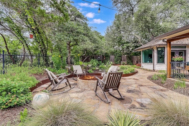 3110 Barton Point Dr, Austin, TX 78733 - fenced backyard with a fire pit and a patio area