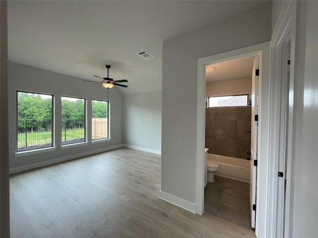 1824 Camay St, Leander, TX 78641 - unfurnished room with healthy amount of natural light, a ceiling fan, and light wood finished floors
