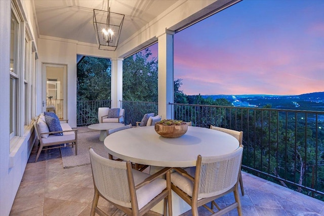 6717 Valburn Dr, Austin, TX 78731 - sunroom featuring a chandelier