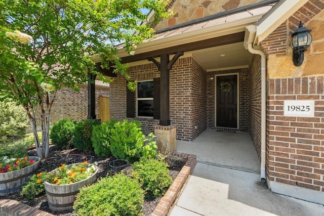 19825 Rhiannon Ln, Pflugerville, TX 78660 - doorway to property featuring brick siding
