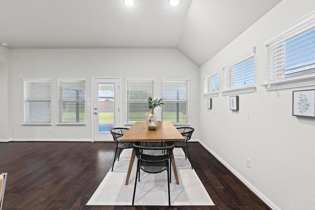 19825 Rhiannon Ln, Pflugerville, TX 78660 - dining area featuring dark wood-type flooring, vaulted ceiling, and recessed lighting