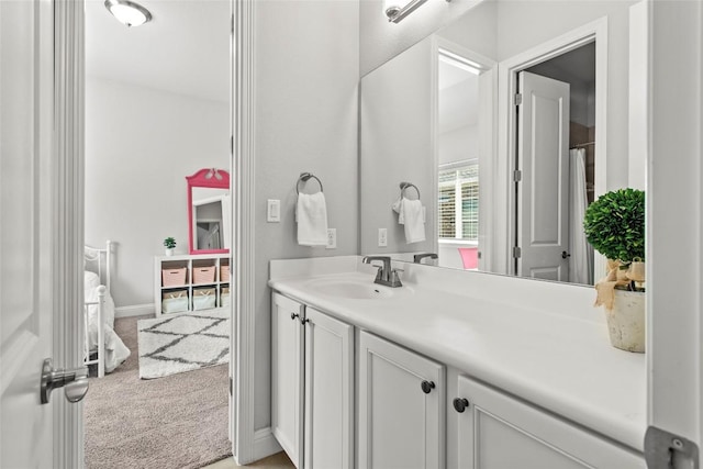 226 Brentwood Dr, Austin, TX 78737 - full bathroom with vanity and baseboards