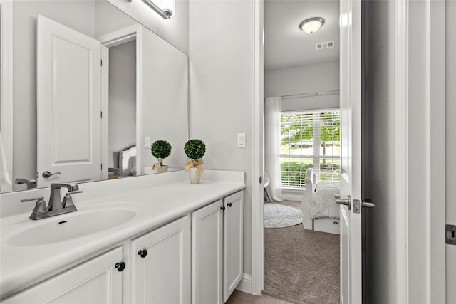 226 Brentwood Dr, Austin, TX 78737 - bathroom featuring vanity, ensuite bath, and washer / dryer