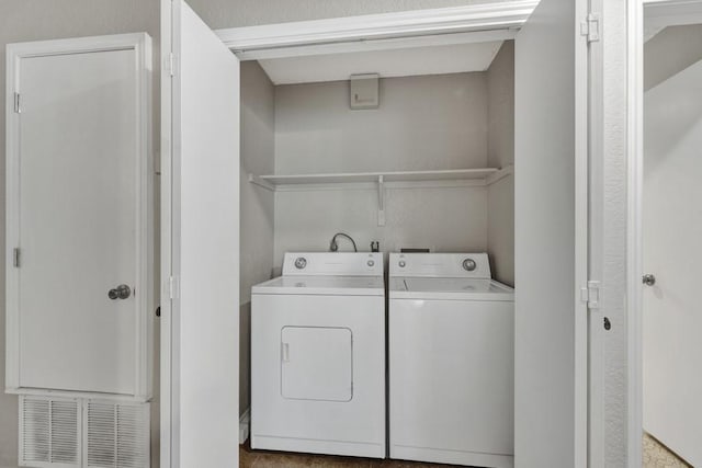 1202 Thorpe Ln Unit 708, San Marcos, TX 78666 - laundry room with washer and clothes dryer