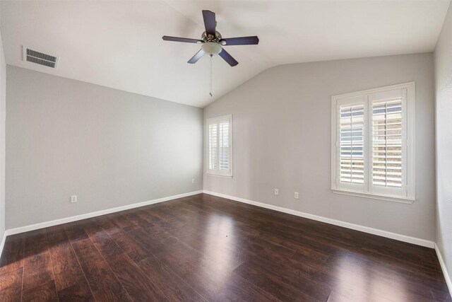 1704 Big Bend Dr, Cedar Park, TX 78613 - unfurnished room featuring a ceiling fan, lofted ceiling, and dark wood-style flooring