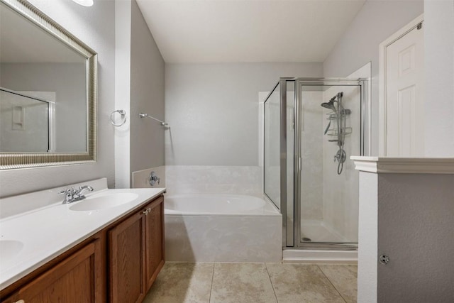 1704 Big Bend Dr, Cedar Park, TX 78613 - bathroom with a bath, a shower stall, double vanity, and tile patterned floors