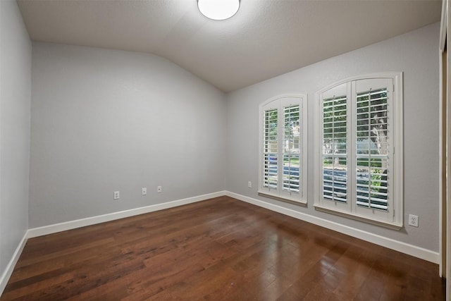 1704 Big Bend Dr, Cedar Park, TX 78613 - empty room featuring lofted ceiling and dark wood-type flooring