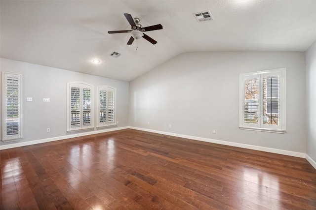 1704 Big Bend Dr, Cedar Park, TX 78613 - unfurnished living room with ceiling fan, dark wood-style flooring, vaulted ceiling, and healthy amount of natural light