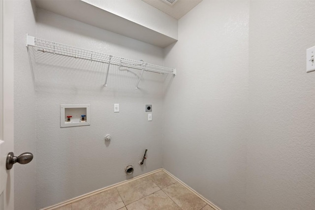 1704 Big Bend Dr, Cedar Park, TX 78613 - washroom featuring hookup for a gas dryer, hookup for a washing machine, tile patterned floors, and electric dryer hookup
