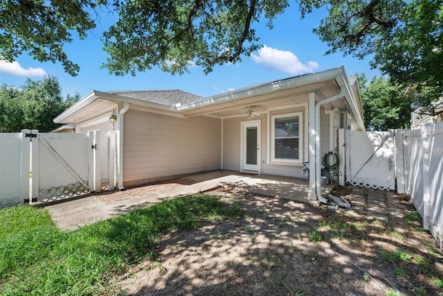 1704 Big Bend Dr, Cedar Park, TX 78613 - rear view of house featuring a gate, a patio area, and a fenced backyard