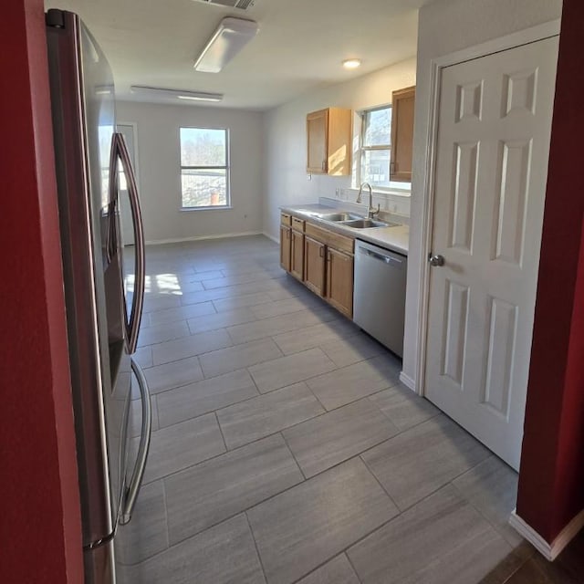 211 Valley Run Trl, Elgin, TX 78621 - kitchen with appliances with stainless steel finishes and light countertops