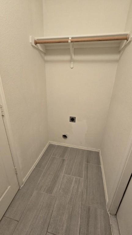 211 Valley Run Trl, Elgin, TX 78621 - laundry room featuring hookup for an electric dryer and wood tiled floors