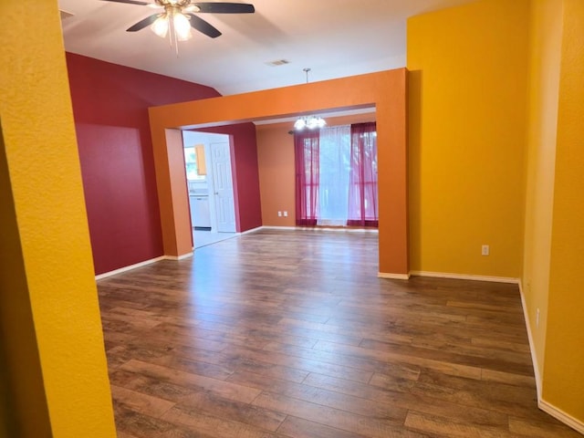 211 Valley Run Trl, Elgin, TX 78621 - empty room featuring wood-type flooring, a ceiling fan, a chandelier, and lofted ceiling