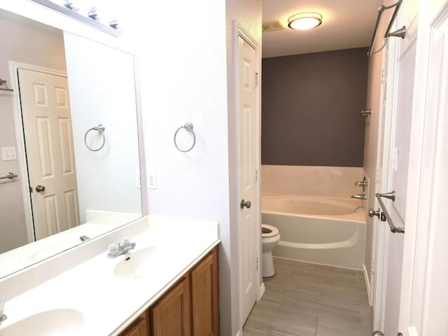 211 Valley Run Trl, Elgin, TX 78621 - bathroom with a garden tub and double vanity