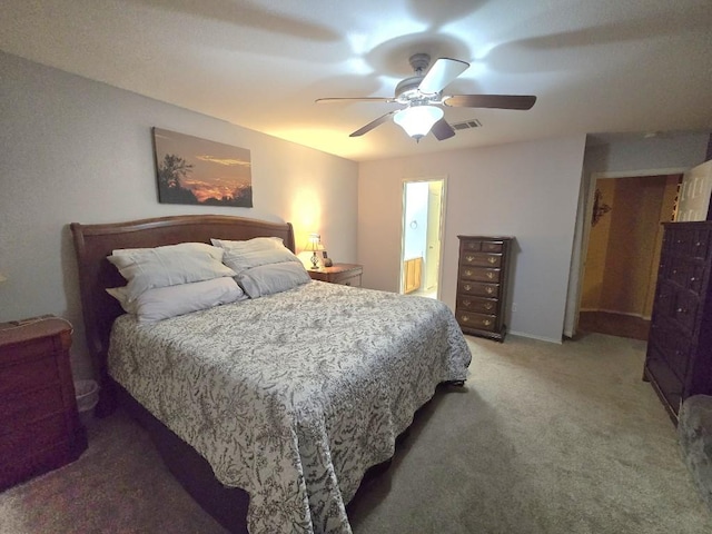 211 Valley Run Trl, Elgin, TX 78621 - bedroom featuring light colored carpet, a ceiling fan, and ensuite bath