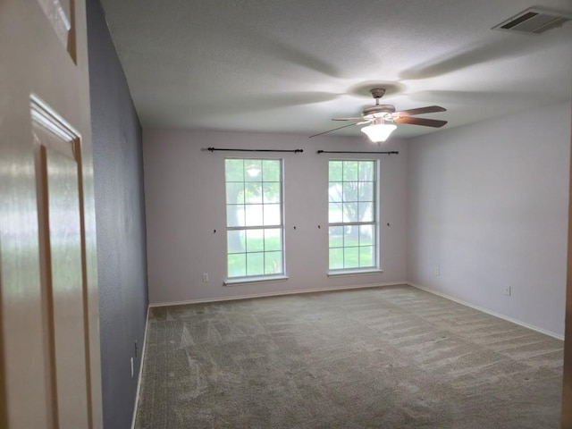 211 Valley Run Trl, Elgin, TX 78621 - carpeted empty room featuring a ceiling fan and baseboards