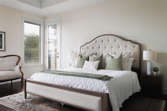 4001 Firstview Dr, Austin, TX 78731 - bedroom with wood finished floors and access to outside