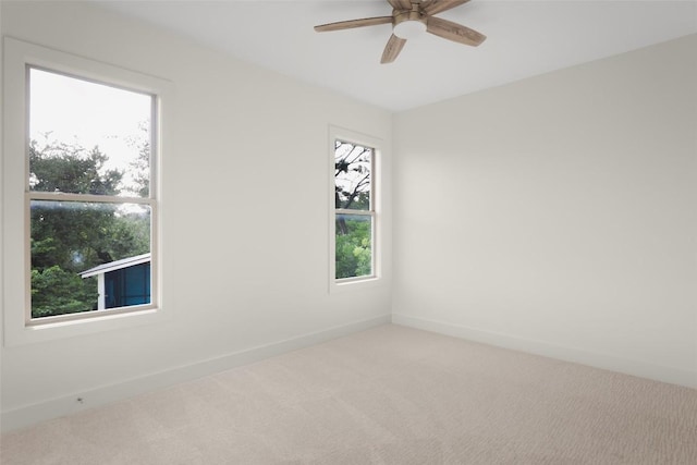 4001 Firstview Dr, Austin, TX 78731 - empty room with carpet floors, plenty of natural light, and a ceiling fan