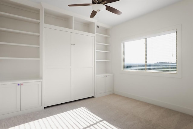 4001 Firstview Dr, Austin, TX 78731 - unfurnished bedroom with light colored carpet and a ceiling fan