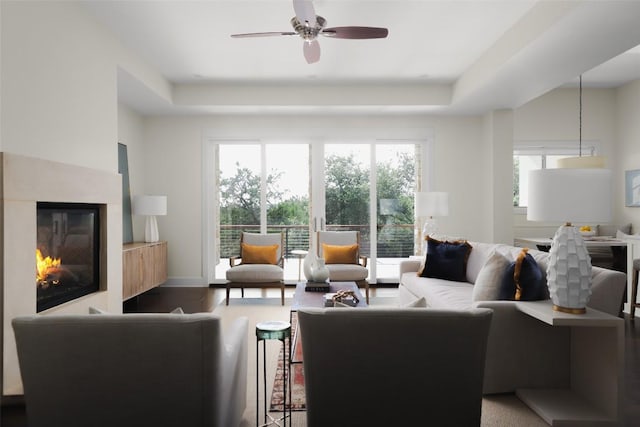 4001 Firstview Dr, Austin, TX 78731 - living room with plenty of natural light, ceiling fan, a glass covered fireplace, and a tray ceiling