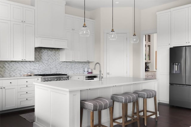 4001 Firstview Dr, Austin, TX 78731 - kitchen featuring high end refrigerator, backsplash, light countertops, a breakfast bar, and white cabinetry