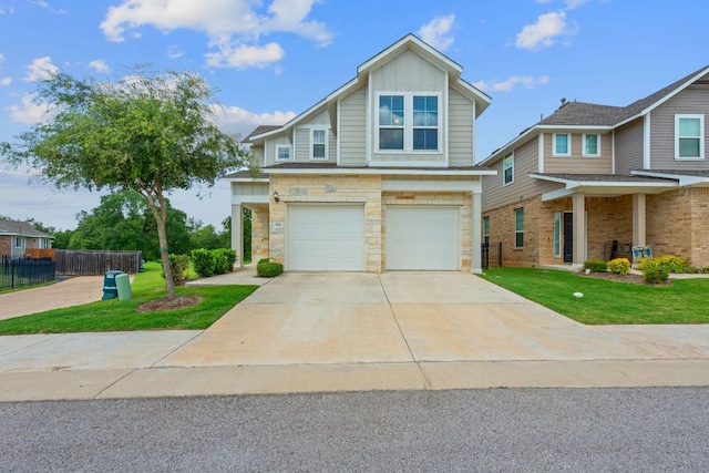2800 Joe Dimaggio Blvd Unit 84, Round Rock, TX 78665 - view of front of house with a garage, concrete driveway, stone siding, and board and batten siding