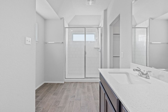 2800 Joe Dimaggio Blvd Unit 84, Round Rock, TX 78665 - full bathroom with a shower stall, vanity, and wood finished floors