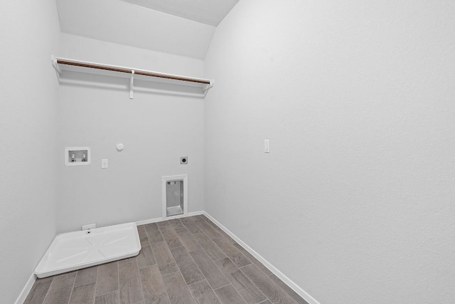 2800 Joe Dimaggio Blvd Unit 84, Round Rock, TX 78665 - laundry room with washer hookup, hookup for an electric dryer, dark wood-style flooring, and hookup for a gas dryer