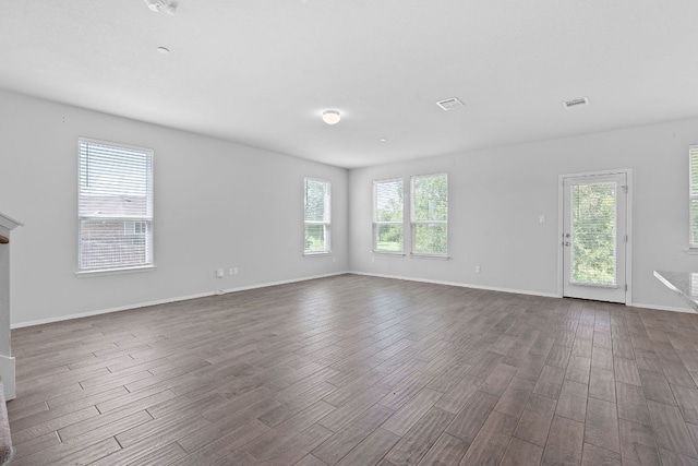 2800 Joe Dimaggio Blvd Unit 84, Round Rock, TX 78665 - unfurnished room with dark wood-style flooring and baseboards