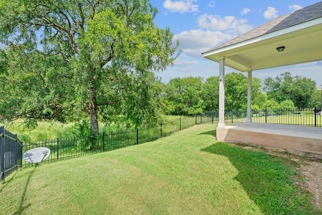 2800 Joe Dimaggio Blvd Unit 84, Round Rock, TX 78665 - fenced backyard featuring a patio area and view of scattered trees